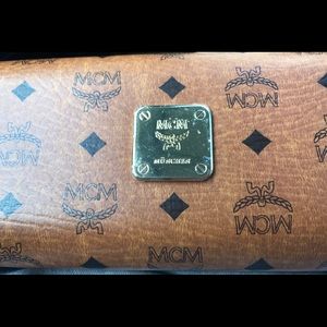 MCM woman sunglasses;new with defects